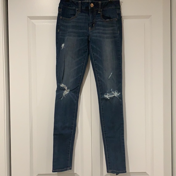 Distressed Mid-Rise Jegging - Picture 1 of 4
